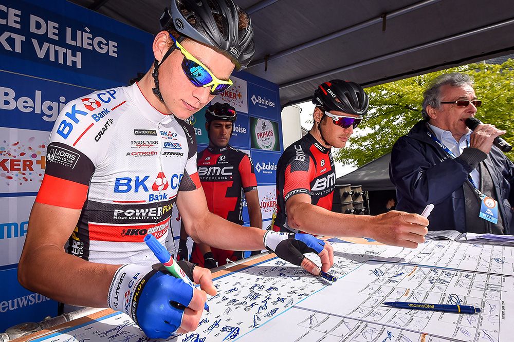 Riders sign in before the final stage in Belgium.