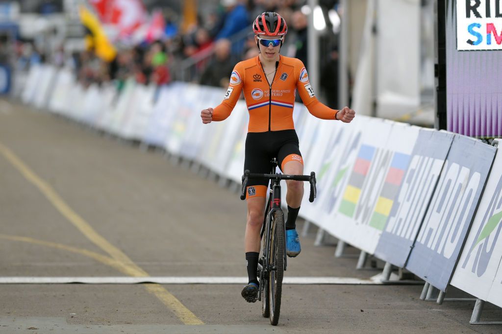 Fifth-placed Pim Ronhaar celebrates his teammate's victory