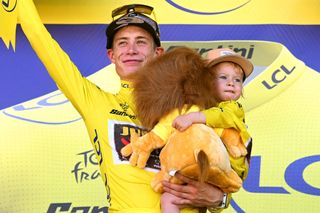 ROCAMADOUR FRANCE JULY 23 Jonas Vingegaard Rasmussen of Denmark and Team Jumbo Visma with his daughter Frida celebrate winning the Yellow Leader Jersey on the podium ceremony after the 109th Tour de France 2022 Stage 20 a 407km individual time trial from LacapelleMarival to Rocamadour TDF2022 WorldTour on July 23 2022 in Rocamadour France Photo by Dario BelingheriGetty Images