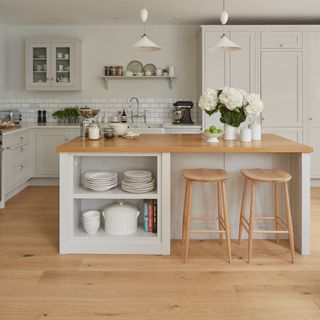 kitchen room with wooden flooring and wooden kitchen worktop