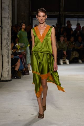 the orange and green spring 2025 color combination trend at Dries Van Noten