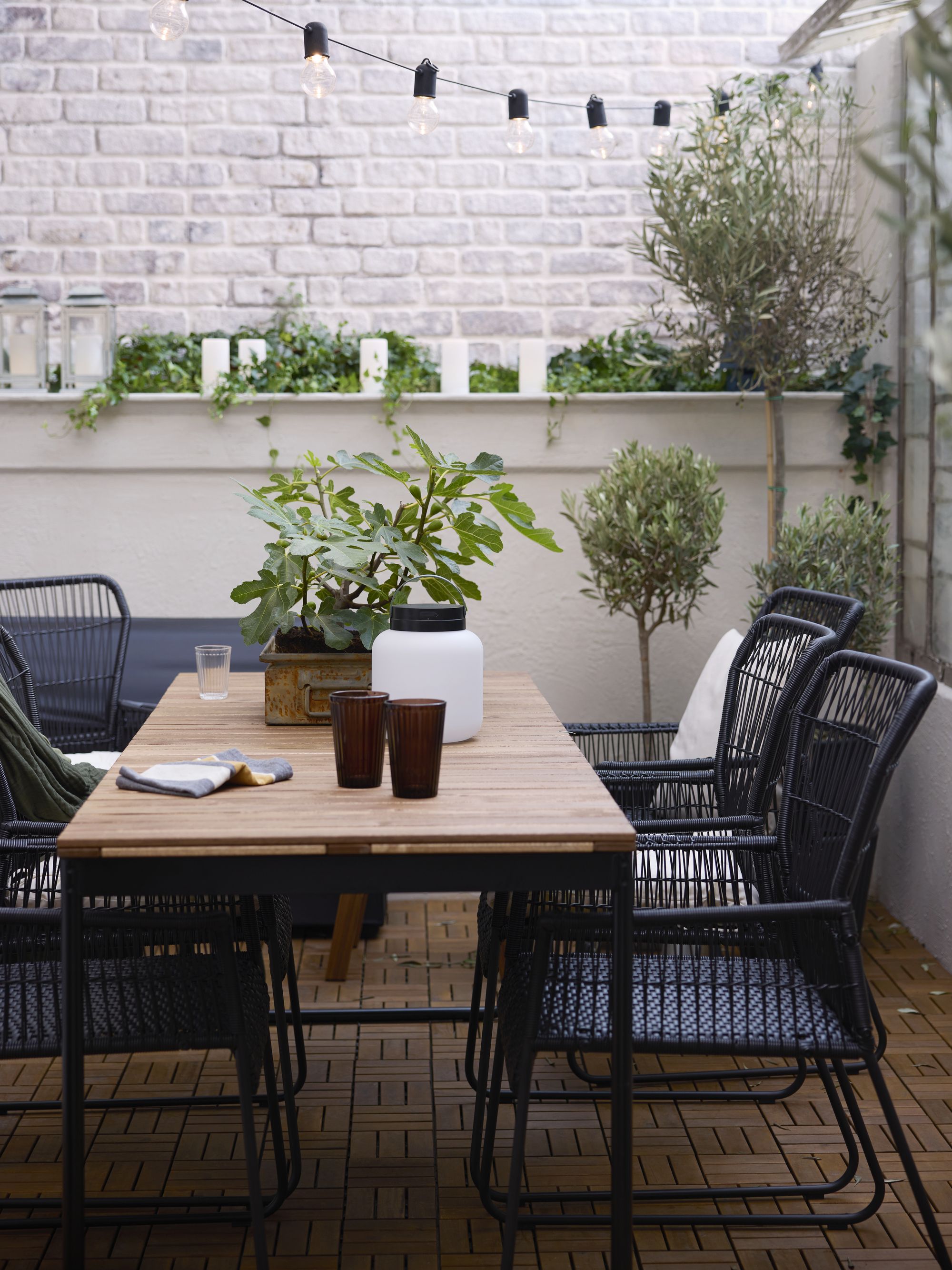 You'd Never Guess This Sleek £150 Outdoor Dining Table Is From IKEA — And It Conveniently 'Grows' With Your Guest List