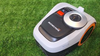 Navimow i2 AWD robot mower in action on astroturf