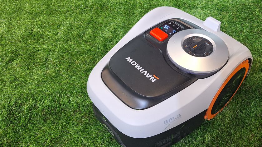 Navimow i2 AWD robot mower in action on astroturf