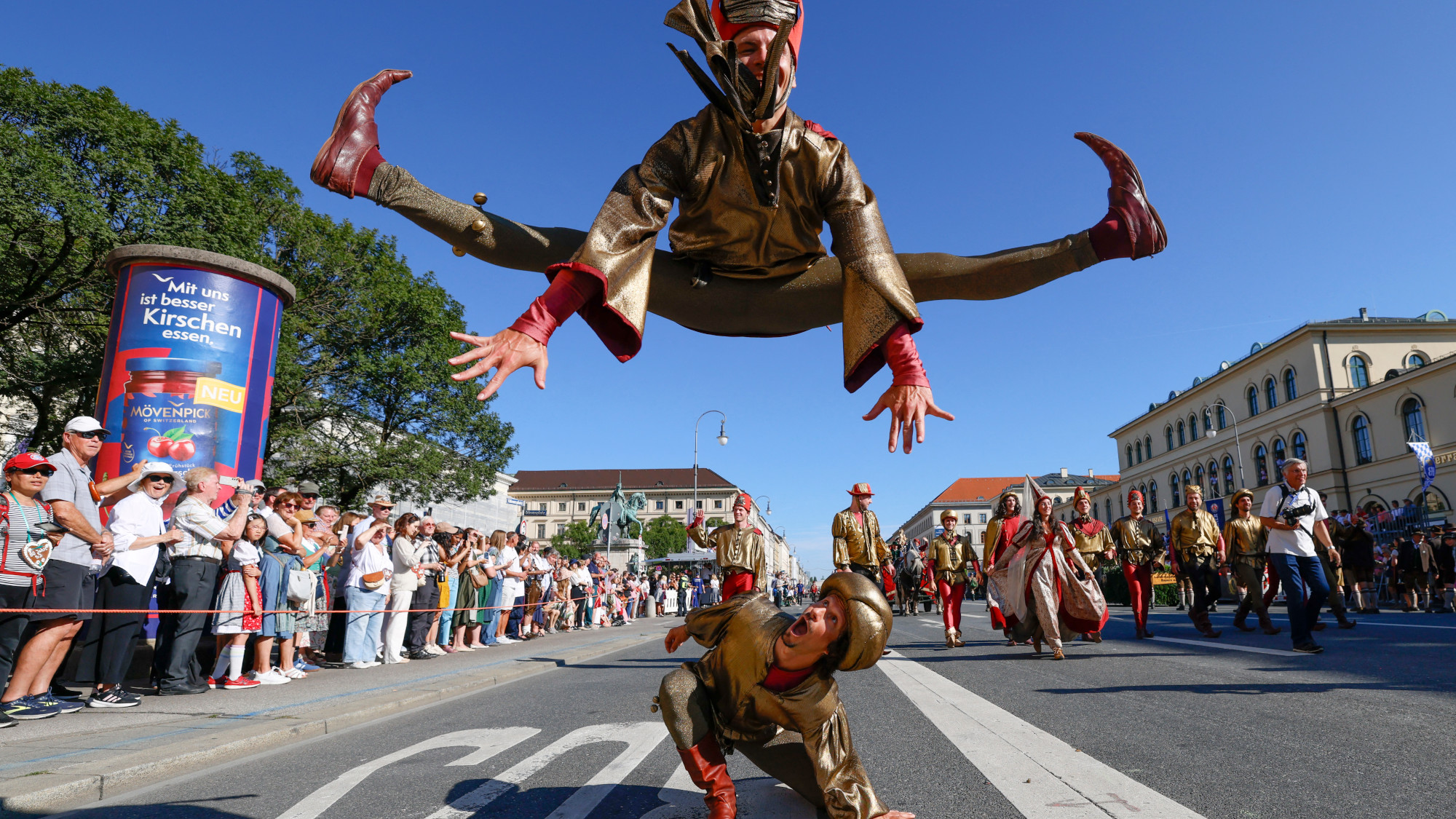 A man jumping over another man