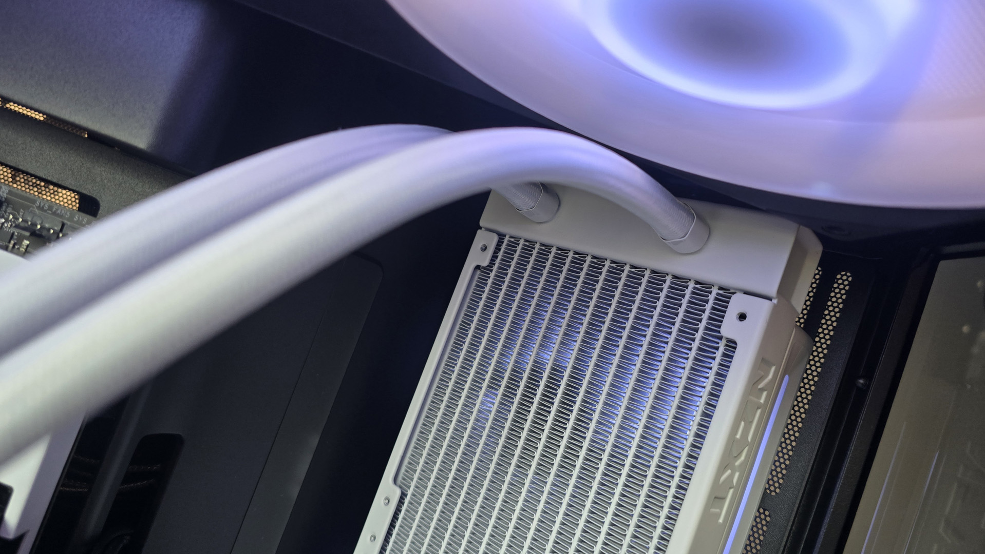 The NZXT Kraken Plus 360 RGB liquid cooler installed in a test bench.