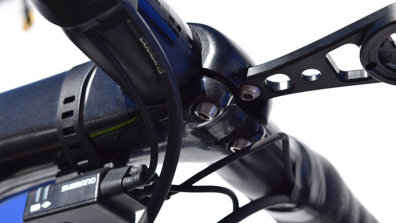 Two more traditional faceplate bolts are located on the underside of the stem