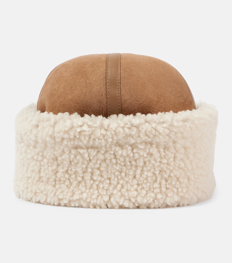 Topi Shearling dan Suede Berbalut Kulit