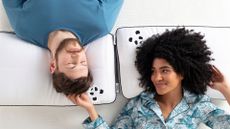 man and woman lying on Panda Hybrid pillows
