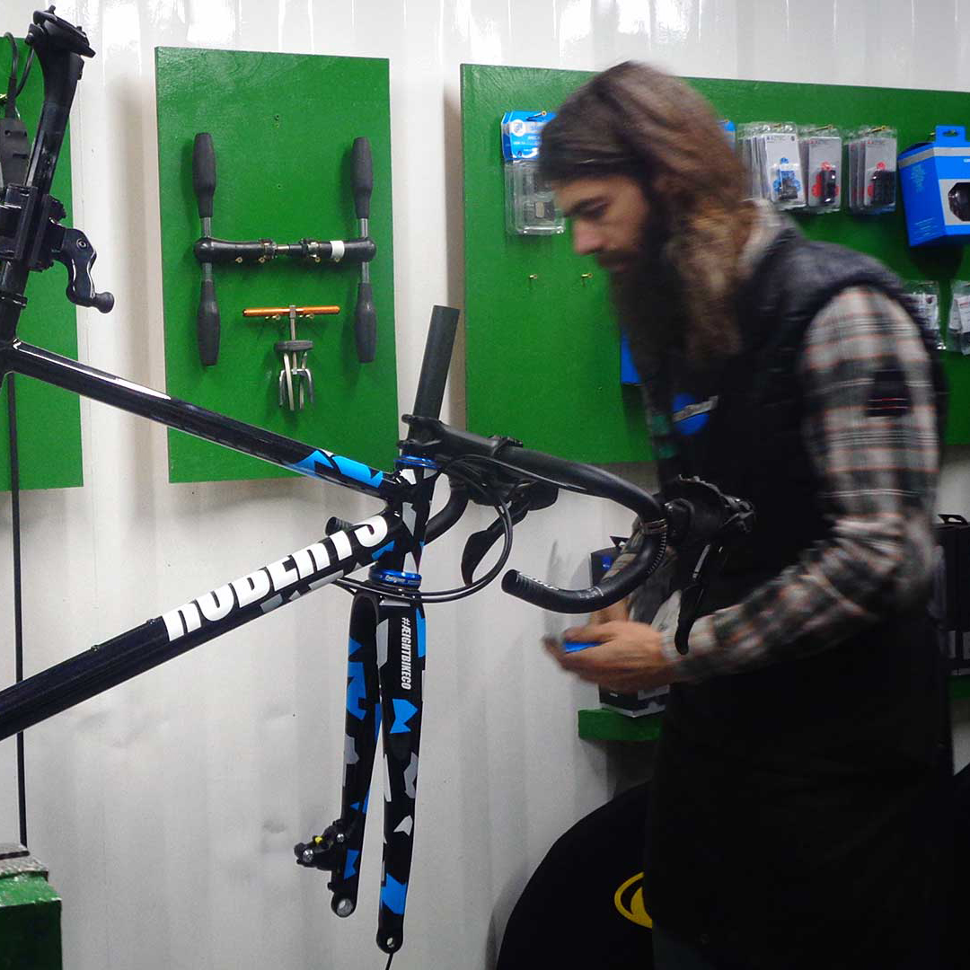 Glen Whittingham working on a steel road bike.