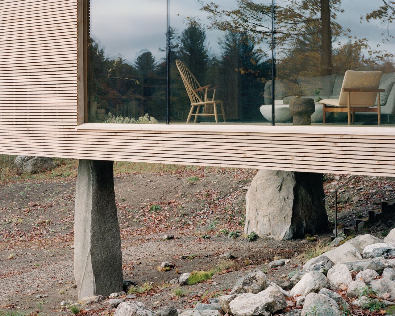 Step inside this serene upstate New York retreat perched on boulders