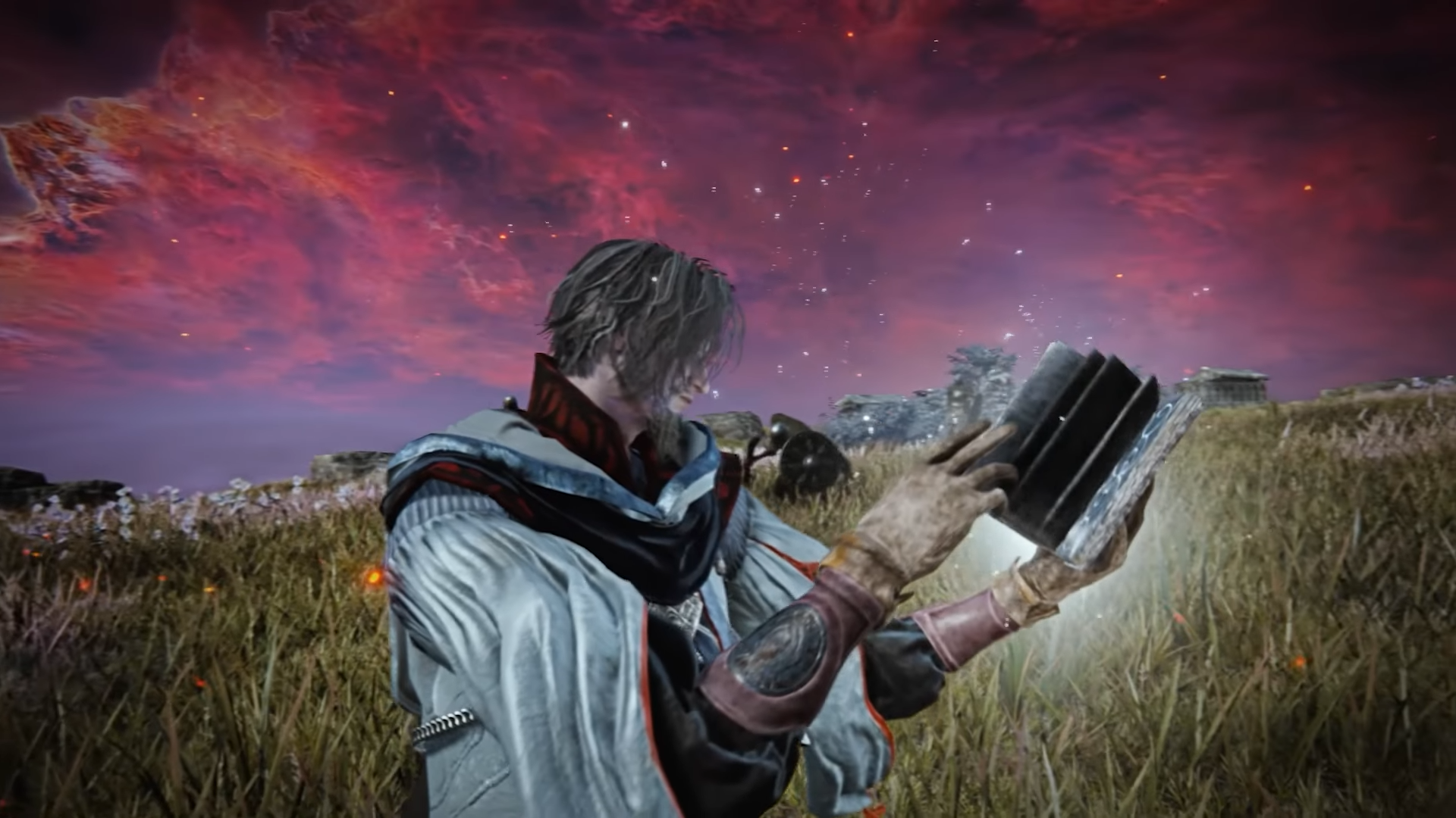 A screencap of the Elden Ring: Nighreign DLC trailer. A man in robes prepares to cast a spell from a tome.