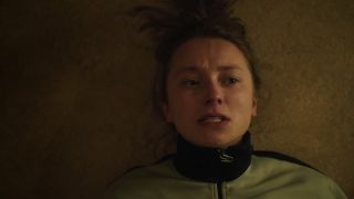 A frustrated woman lying on the floor in Ninjababy