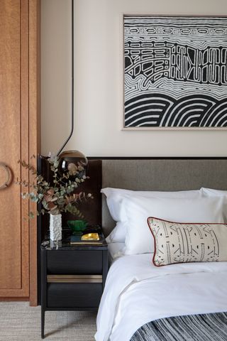 Grey bedroom with built in grey headboard