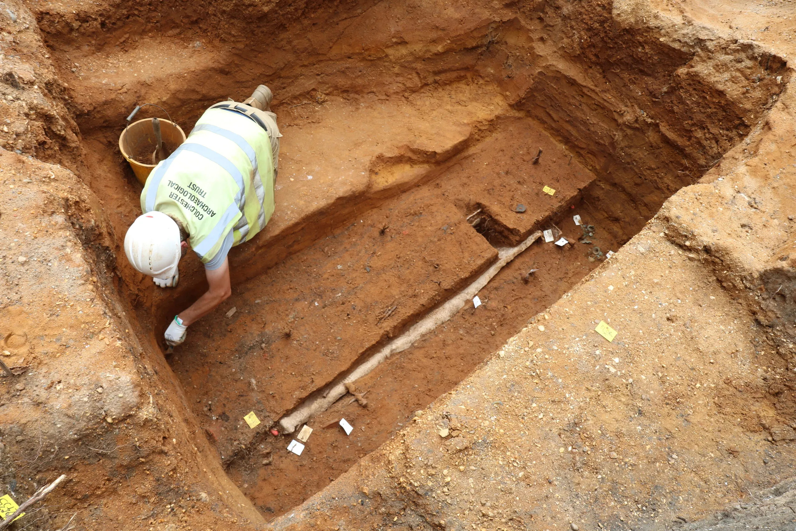 Archaeologist working on the excavation site where the burial was found.
