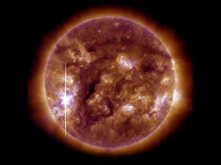NASA's Solar Dynamics Observatory captured this image of an X3.3-class solar flare that peaked at 5:12 p.m. EST on Nov. 5, 2013. This image shows light blended from the 131 and 193 wavelengths.