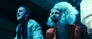 Ida screaming out next to a smiling Frank during gala even in The Bride