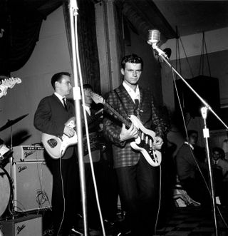 Dick Dale with Fender Reverb and Dual Showman amplifier and 2x15" speaker cabinet