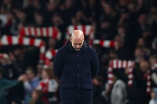 Pep Guardiola, Manager of Manchester City, looks dejected during the Premier League match between Arsenal FC and Manchester City FC at Emirates Stadium on February 02, 2025 in London, England.