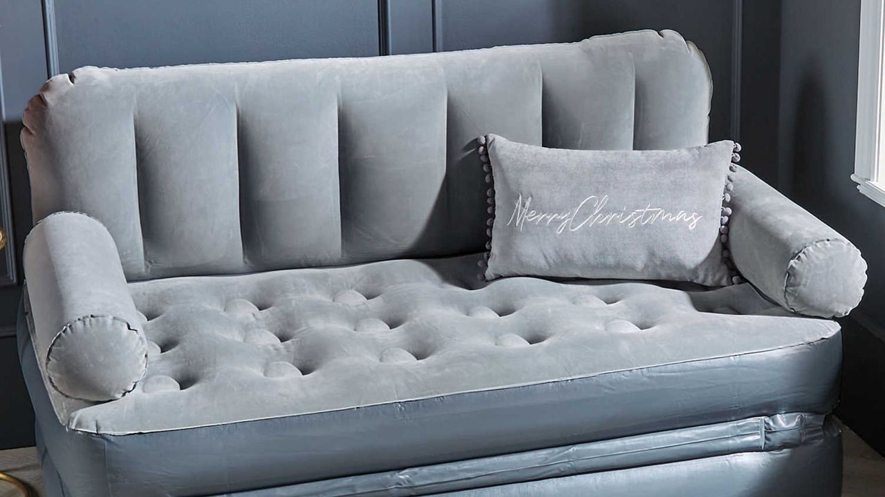 Aldi inflatable pull out sofa bed in grey room