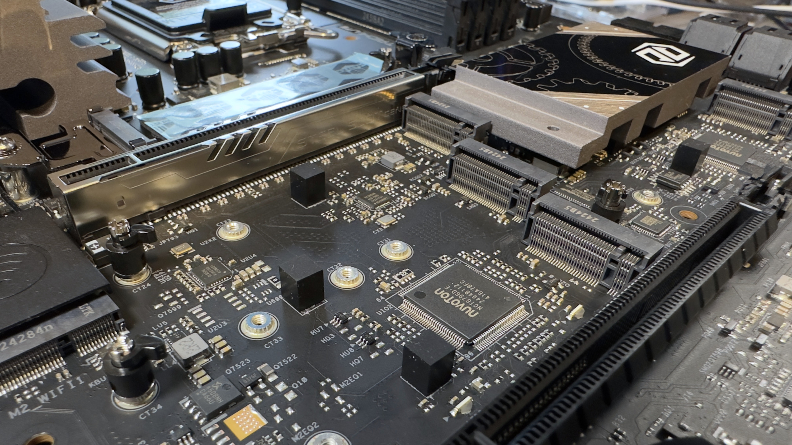 A photo of an ASRock Z890 Taichi Lite motherboard