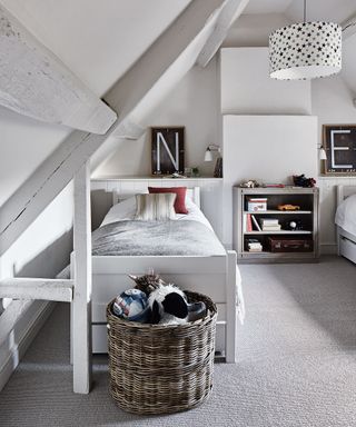 Grey loft bedroom with single beds