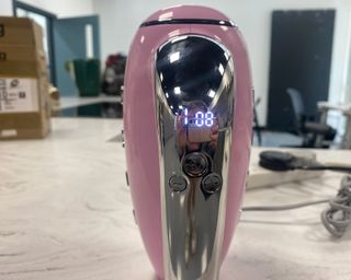 Image of Smeg hand mixer interface with LED screen during testing