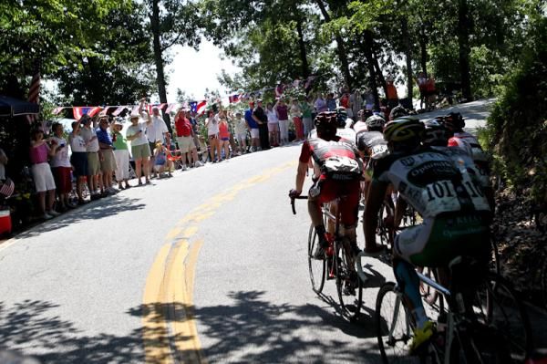 Fans cheer the group that nears the top of Paris Mountain.