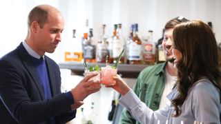 Prince William and Kate Middleton testing their cocktails after visiting Trademarket outdoor market, as part of the royal visit to Northern Ireland on October 6, 2022 in Belfast,