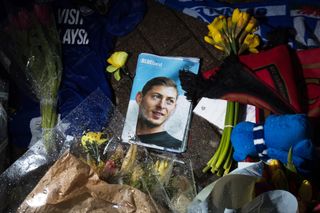 Tributes were left to the footballer outside Cardiff City's stadium after he died (Aaron Chown/PA)
