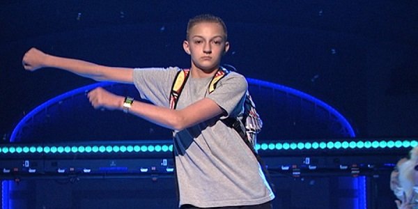 Backpack Kid performing floss dance