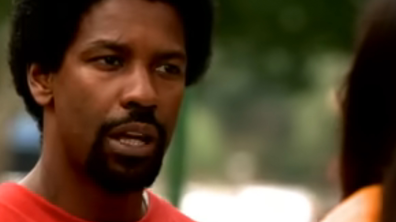 A close up of Denzel Washington with an afro in He Got Game