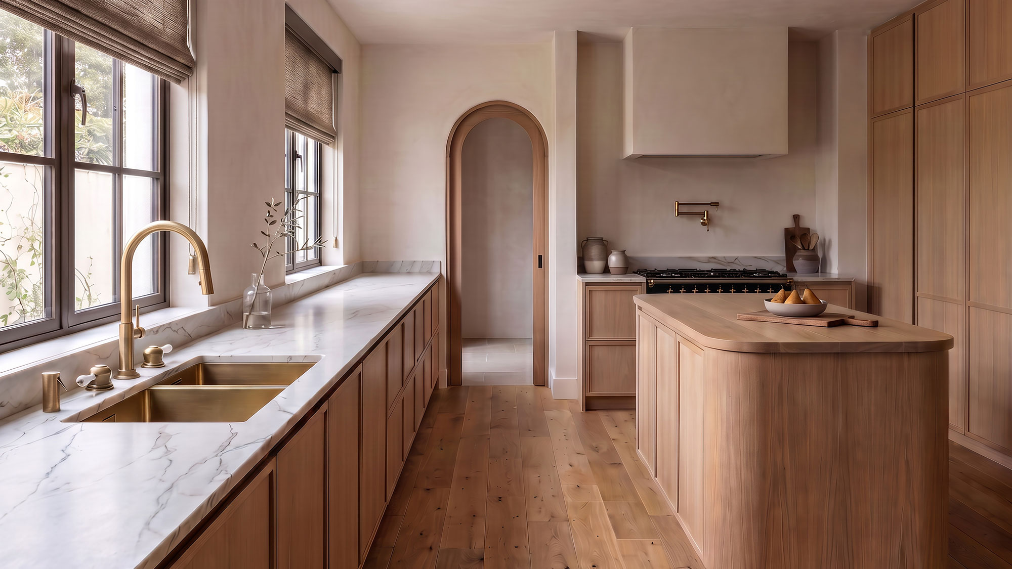 modern wooden kitchen with marble composite worktops and brass boiling water tap