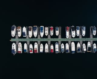 An aerial view of boats in a harbor