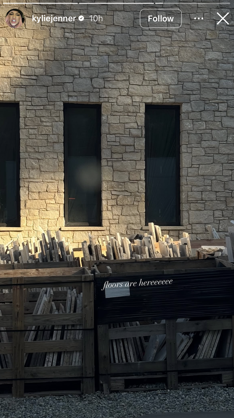 screenshot from kylie jenner's instagram of crates holding stone floor tiles with caption written "floors are hereeeeeeee"