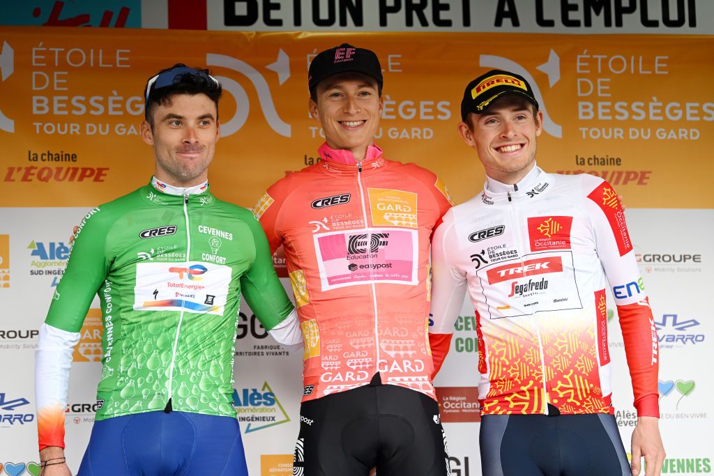 ALES FRANCE FEBRUARY 05 LR Pierre Latour of France and Team TotalEnergies green jersey Neilson Powless of The United States and Team EF Education Easypost Orange Leader Jersey and Mattias Skjelmose of Denmark and Team TrekSegafredo White best young jersey celebrate at podium during the 53rd Etoile de Besseges Tour Du Gard 2023 Stage 5 a 1066km individual time trial stage from Ales to Ales EDB2021 on February 05 2023 in Ales France Photo by Luc ClaessenGetty Images