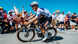 Remco Evenepoel climbing at the Tour de France 