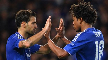 Cesc Fabregas and Loic Remy of Chelsea