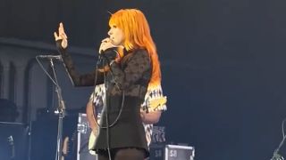 Hayley Williams on stage with Paramore