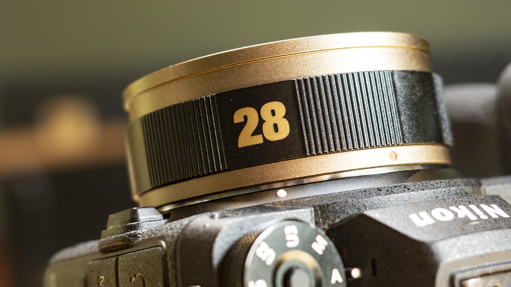 PolarPro LightLeak Lens, 28mm, attached to a Nikon mirrorless camera