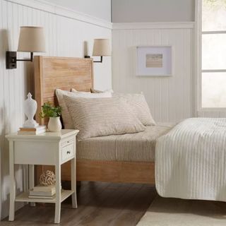 Taupe stripped bed sheets