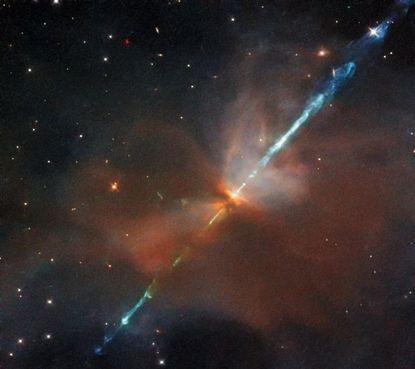 This image by the Hubble Space Telescope’s Wide Field Camera 3 instrument, features the Herbig-Haro object HH111, which lies about 1,300 light-years from Earth. Herbig-Haro objects consist of young stars blasting superheated jets through surrounding clouds of dust and gas.