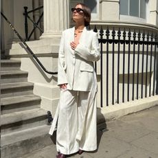 Sophie Robyn Watson wears a white suit from the Roksanda x 
Other Stories collection