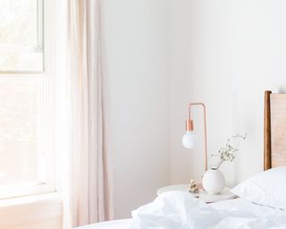 Airy bedroom with window