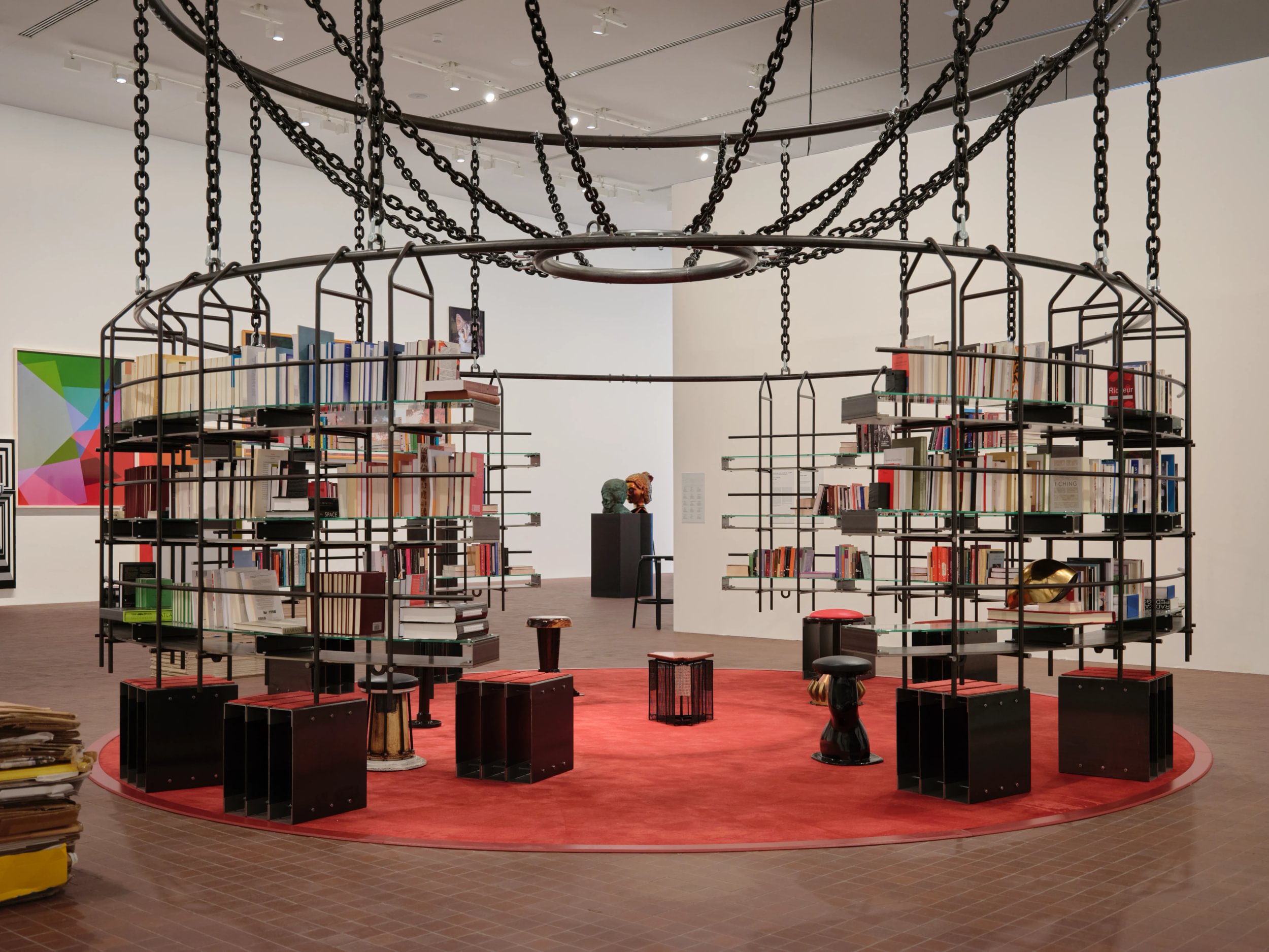 An art installation shaped like a concentric, iron shelving unit.