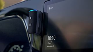 Amazon Echo Auto Gen 2 on dashboard side view.
