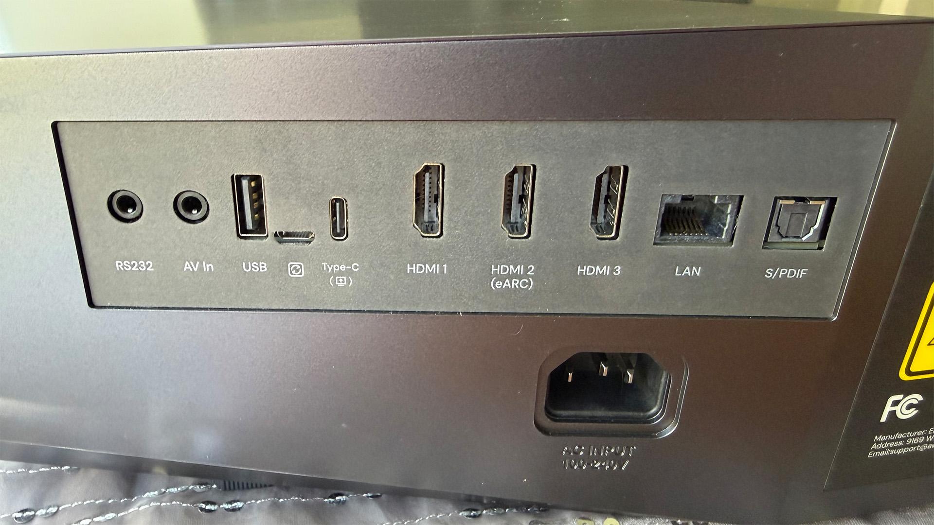 AWOL Vision Aetherion Max ultra short throw projector close up on connections
