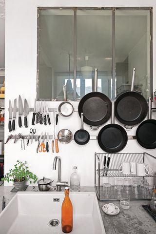 kitchen countertop with utensils displayed