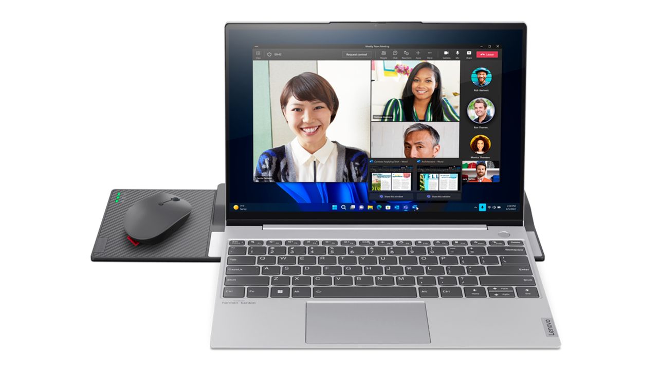 Lenovo Wireless Dock for ThinkBook 13x (Gen 2), with laptop docked and mouse charging, seen from the front.
