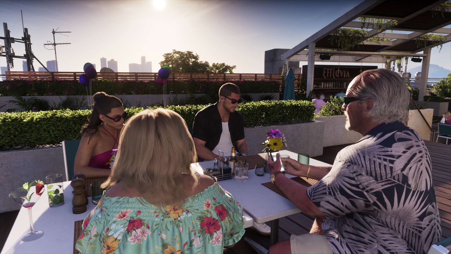 Lucia and Jason sit and drink with Brian Heder and his wife, from the GTA 6 extended look